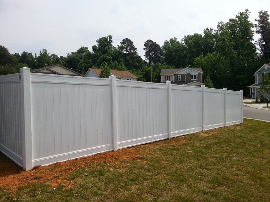 White vinyl fence with gate