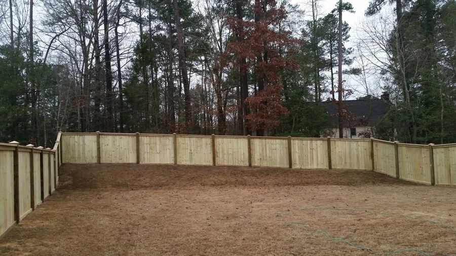 Wood cap and trim fence corner detail